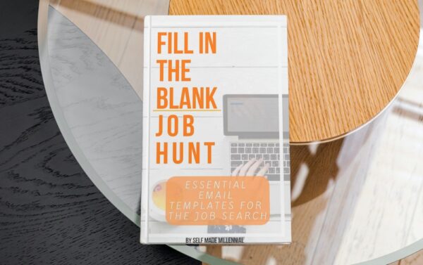 The image shows a book on a glass and wood table. The book is called Fill In The Blanks Job Hunt by Madeline Mann of Self Made Millennial